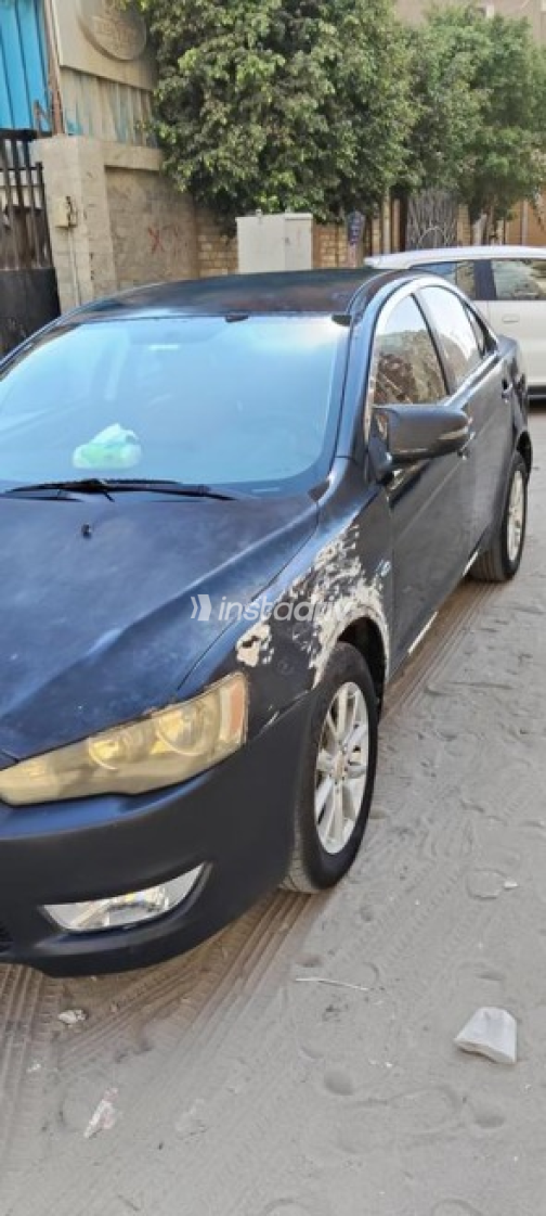 ميتسوبيشي لانسر اى اكس شارك 2015 أسود أوتوماتيك مستعملة للبيع في الجيزة - 6