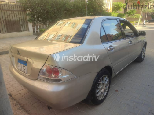 Mitsubishi Lancer 2004 Silver Manual Used for Sale in Giza - 2