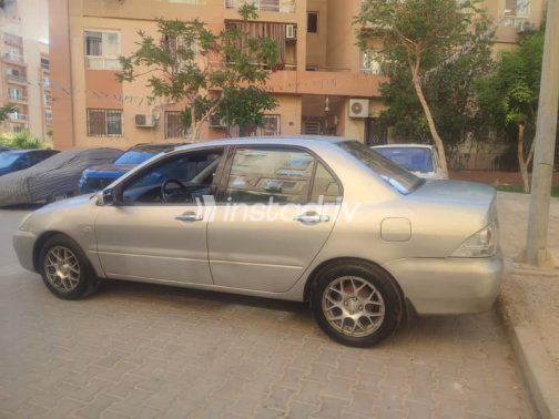 Mitsubishi Lancer 2004 Silver Manual Used for Sale in Giza - 3