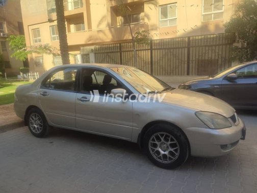 Mitsubishi Lancer 2004 Silver Manual Used for Sale in Giza - 4