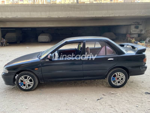 Mitsubishi Lancer 1992 Black Manual Used for Sale in Cairo - 1