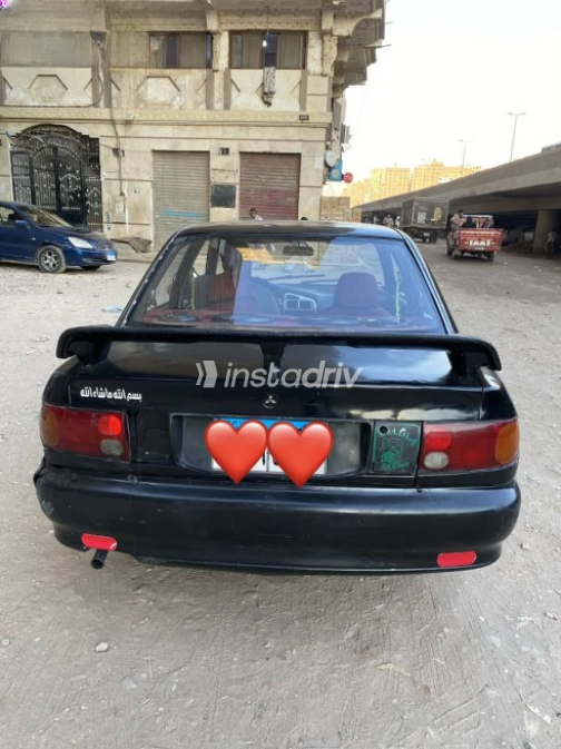 Mitsubishi Lancer 1992 Black Manual Used for Sale in Cairo - 9