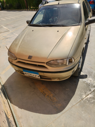 فيات سينا 2001 ذهبي يدوي مستعملة للبيع في القاهرة الكبرى ( القاهرة - الجيزة)