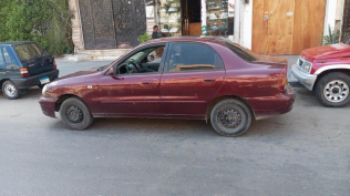 Chevrolet Lanos 2013 Dark Red Manual Used for Sale in Alexandria