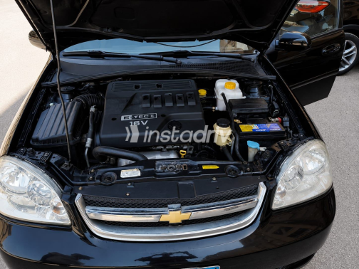 Chevrolet Optra 2012 Black Manual Used for Sale in Nasr city - 1