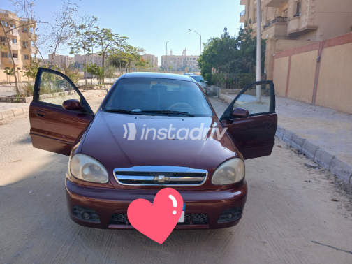 شيفروليه لانوس 2014 أبيض يدوي مستعملة للبيع في الجيزة - 3