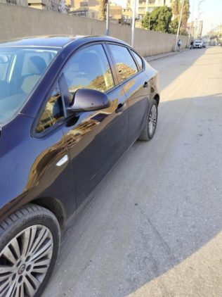 Opel Astra 2014 Eggplant Automatic Used for Sale in El Haram