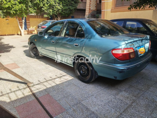 Nissan Sunny 2002 Olive Green Automatic Used for Sale in Ashmoun - 3