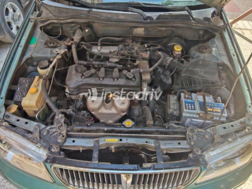 Nissan Sunny 2002 Olive Green Automatic Used for Sale in Ashmoun - 6