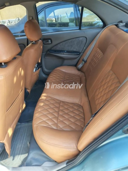 Nissan Sunny 2002 Olive Green Automatic Used for Sale in Ashmoun - 7