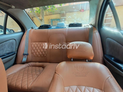 Nissan Sunny 2002 Olive Green Automatic Used for Sale in Ashmoun - 10
