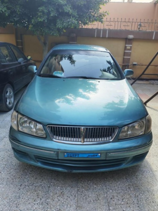 Nissan Sunny 2002 Olive Green Automatic Used for Sale in Ashmoun