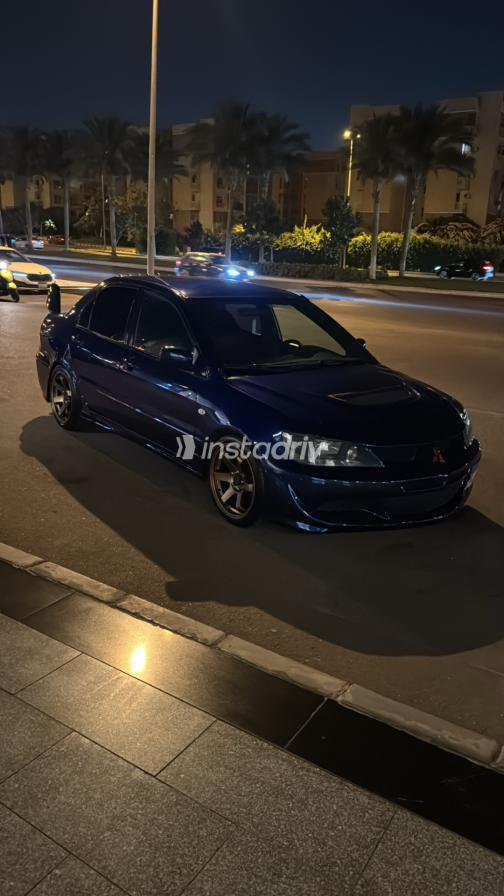 Mitsubishi Lancer 2002 Blue Manual Used for Sale in Madinaty - 1