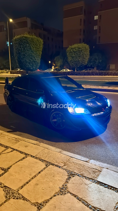 Mitsubishi Lancer 2002 Blue Manual Used for Sale in Madinaty - 3