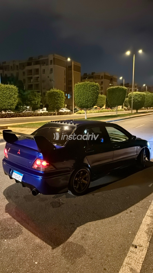 Mitsubishi Lancer 2002 Blue Manual Used for Sale in Madinaty - 4