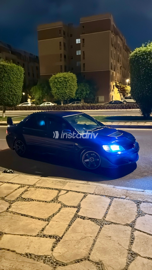 Mitsubishi Lancer 2002 Blue Manual Used for Sale in Madinaty - 7