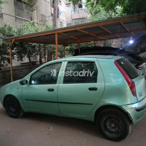Fiat Punto 2002 Turquoise Manual Used for Sale in El Haram - 9