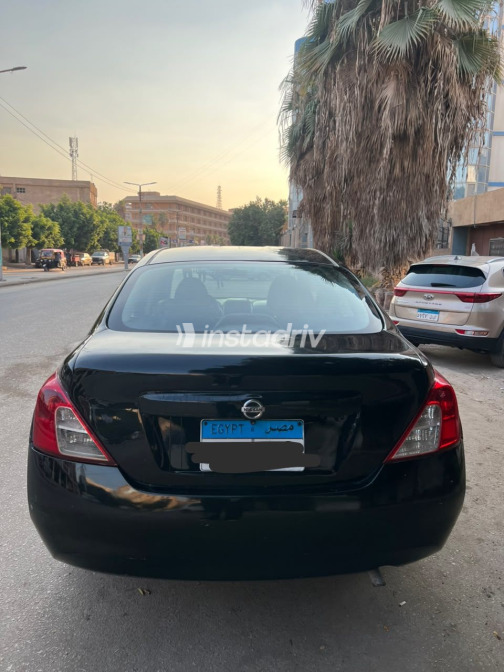 Nissan Sunny 2013 Black Automatic Used for Sale in Kafr Shukr - 5
