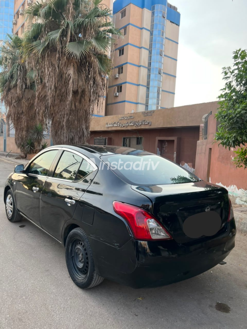 Nissan Sunny 2013 Black Automatic Used for Sale in Kafr Shukr - 8