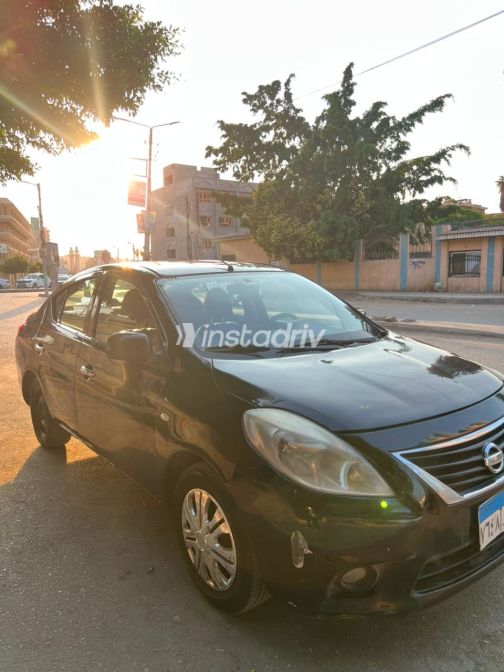 Nissan Sunny 2013 Black Automatic Used for Sale in Kafr Shukr - 9
