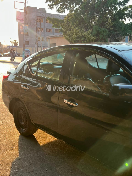 Nissan Sunny 2013 Black Automatic Used for Sale in Kafr Shukr - 10
