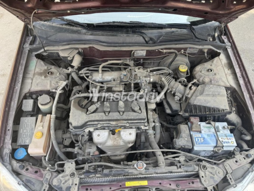 Nissan Sunny 2010 Dark Red Automatic Used for Sale in Cairo - 4