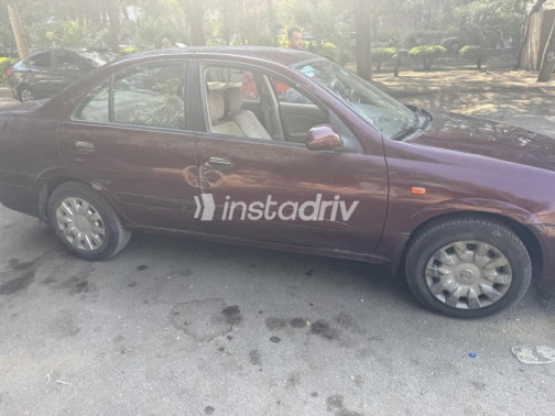 Nissan Sunny 2010 Dark Red Automatic Used for Sale in Cairo - 6