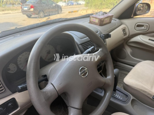 Nissan Sunny 2010 Dark Red Automatic Used for Sale in Cairo - 10