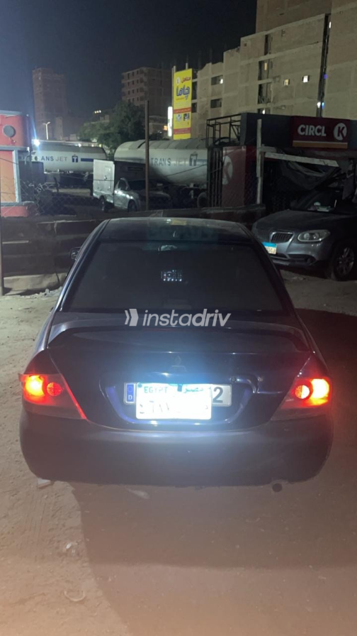 Mitsubishi Lancer Puma 2013 White Automatic Used for Sale in Qalyubia - 1