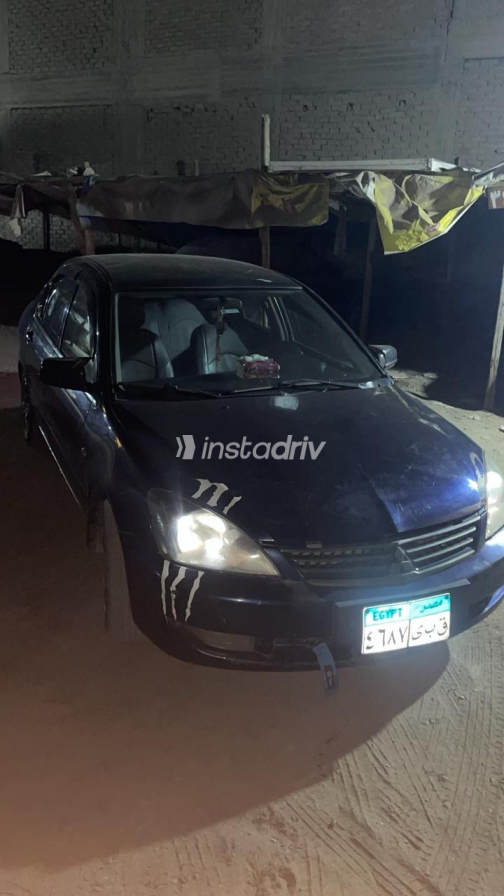 Mitsubishi Lancer Puma 2013 White Automatic Used for Sale in Qalyubia - 3