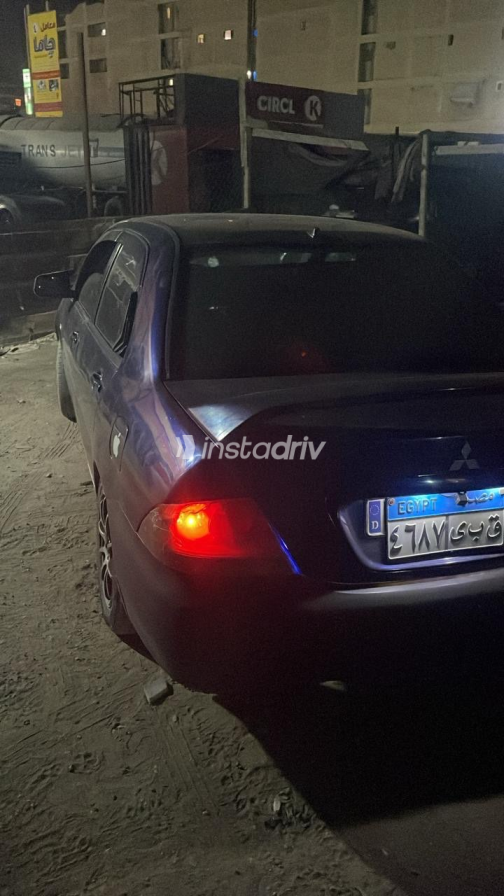 Mitsubishi Lancer Puma 2013 White Automatic Used for Sale in Qalyubia - 4