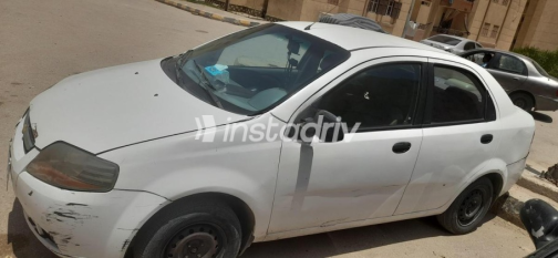 Chevrolet Aveo 2005 White Automatic Used for Sale in Hadayek October - 3