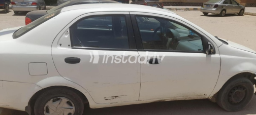 Chevrolet Aveo 2005 White Automatic Used for Sale in Hadayek October - 4