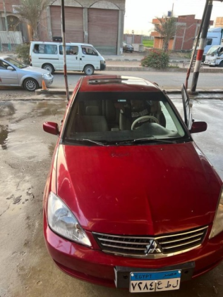 ميتسوبيشي لانسر 2005 أحمر غامق أوتوماتيك مستعملة للبيع في كفر الشيخ