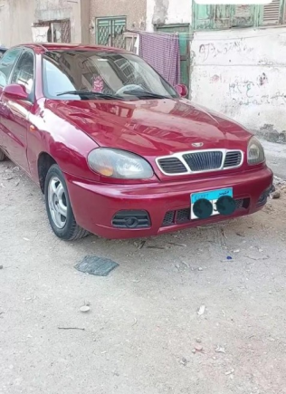 دايو لانوس 2008 أحمر غامق أوتوماتيك مستعملة للبيع في المنصورة