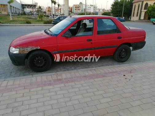 فورد اسكورت 1998 أحمر يدوي مستعملة للبيع في القاهرة الكبرى ( القاهرة - الجيزة) - 1