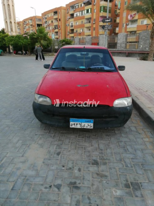 فورد اسكورت 1998 أحمر يدوي مستعملة للبيع في القاهرة الكبرى ( القاهرة - الجيزة) - 2