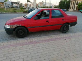 فورد اسكورت 1998 أحمر يدوي مستعملة للبيع في القاهرة الكبرى ( القاهرة - الجيزة)