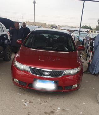 Kia Forte 2012 Dark Red Automatic Used for Sale in Sharqia