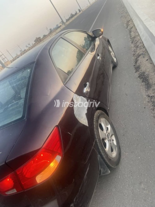 Kia Cerato 2011 Burgundy Automatic Used for Sale in Mokattam - 3