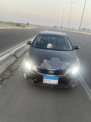 Kia Cerato 2011 Burgundy Automatic Used for Sale in Mokattam