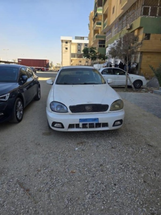 دايو لانوس 2 2007 أبيض أوتوماتيك مستعملة للبيع في العاشر من رمضان