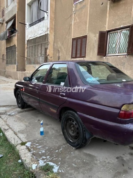 فورد اسكورت 1998 بنفسجي أوتوماتيك مستعملة للبيع في حلوان - 4