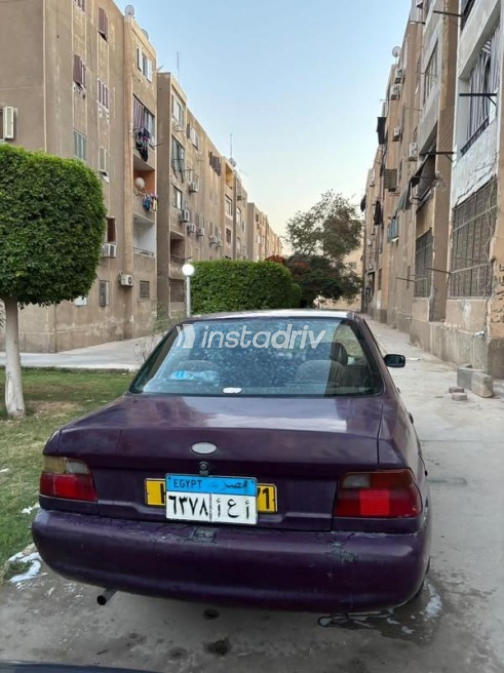 فورد اسكورت 1998 بنفسجي أوتوماتيك مستعملة للبيع في حلوان - 8
