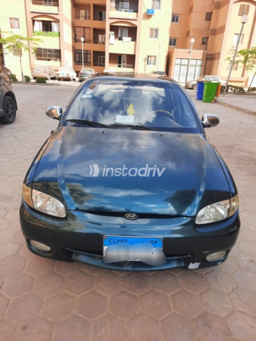 Hyundai Accent 1999 Green Manual Used for Sale in Hadayek October - 1