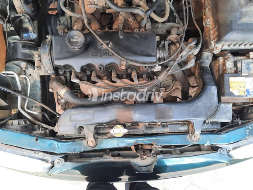 Hyundai Accent 1999 Green Manual Used for Sale in Hadayek October - 3
