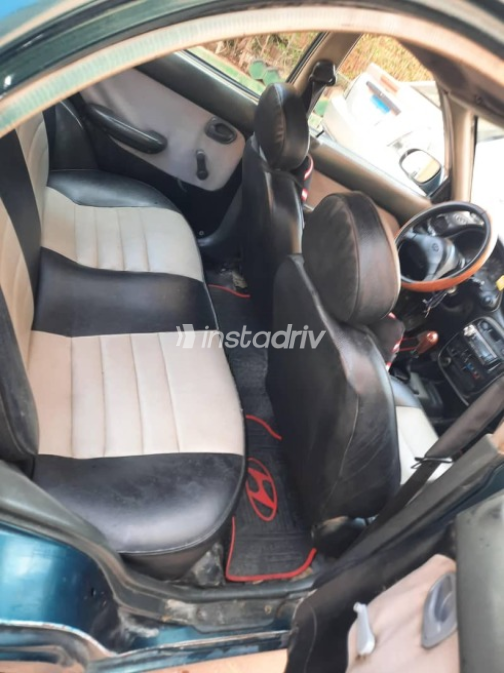 Hyundai Accent 1999 Green Manual Used for Sale in Hadayek October - 4
