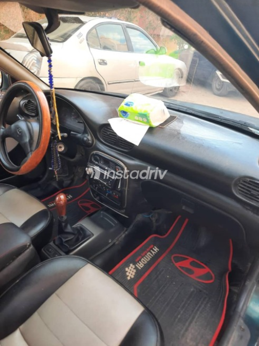 Hyundai Accent 1999 Green Manual Used for Sale in Hadayek October - 5