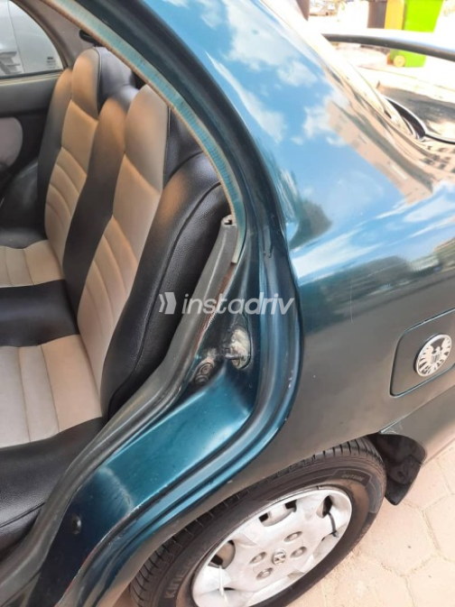 Hyundai Accent 1999 Green Manual Used for Sale in Hadayek October - 9