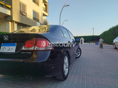 Honda Civic 2009 Black Automatic Used for Sale in Hadayek October - 6